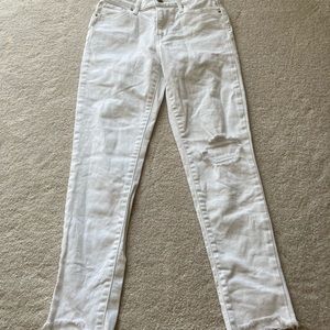 Levi’s distressed white jeans